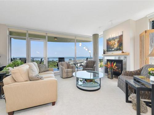 503-738 Sayward Hill Terr, Saanich, BC - Indoor Photo Showing Living Room With Fireplace