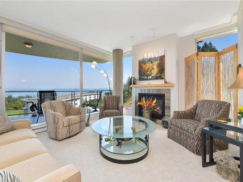 503-738 Sayward Hill Terr, Saanich, BC - Indoor Photo Showing Living Room With Fireplace