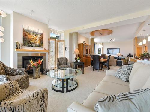 503-738 Sayward Hill Terr, Saanich, BC - Indoor Photo Showing Living Room With Fireplace