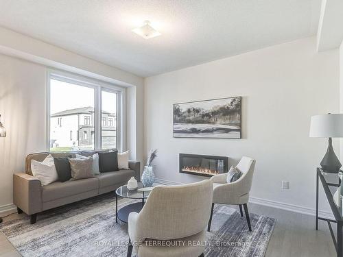 2662 Delphinium Tr, Pickering, ON - Indoor Photo Showing Living Room With Fireplace