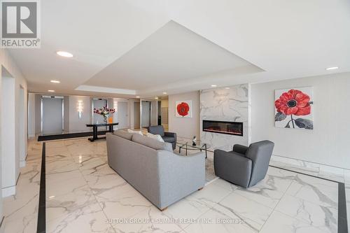 405 - 5280 Lakeshore Road, Burlington, ON - Indoor Photo Showing Other Room With Fireplace