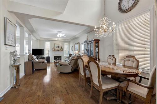 5293 Picketts Way, Burlington, ON - Indoor Photo Showing Dining Room With Fireplace