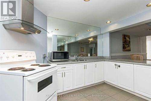 1002 - 25 Trailwood Drive, Mississauga (Hurontario), ON - Indoor Photo Showing Kitchen With Double Sink