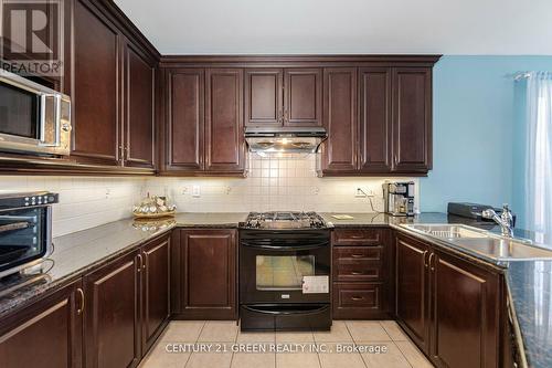 4 Pasadena Avenue, Brampton (Bram East), ON - Indoor Photo Showing Kitchen With Double Sink