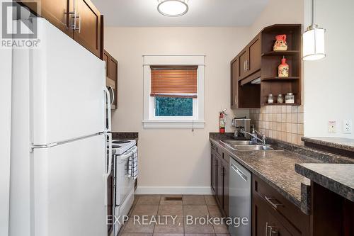 110 - 115 Fairway Court, Blue Mountains, ON - Indoor Photo Showing Kitchen With Double Sink