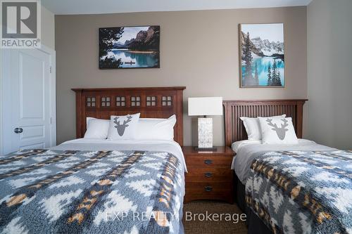 110 - 115 Fairway Court, Blue Mountains, ON - Indoor Photo Showing Bedroom