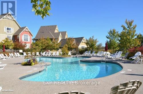 110 - 115 Fairway Court, Blue Mountains, ON - Outdoor With In Ground Pool