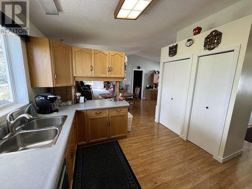 3 Pebble Drive, Fort Nelson, BC - Indoor Photo Showing Kitchen With Double Sink