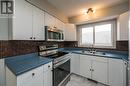 1204 S Tabor Boulevard, Prince George, BC  - Indoor Photo Showing Kitchen 