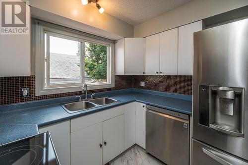 1204 S Tabor Boulevard, Prince George, BC - Indoor Photo Showing Kitchen With Double Sink