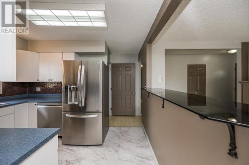 1204 S Tabor Boulevard, Prince George, BC - Indoor Photo Showing Living Room With Fireplace