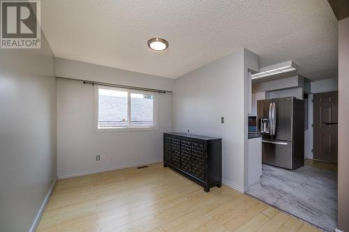 1204 S Tabor Boulevard, Prince George, BC - Indoor Photo Showing Living Room With Fireplace