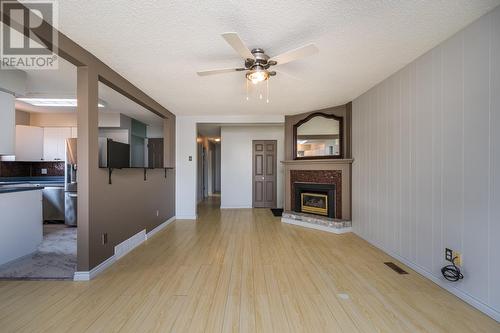 1204 S Tabor Boulevard, Prince George, BC - Indoor Photo Showing Living Room With Fireplace