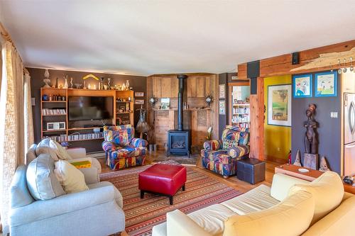 830 Three Mile Road, Penticton, BC - Indoor Photo Showing Living Room With Fireplace