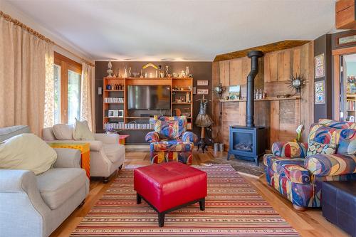 830 Three Mile Road, Penticton, BC - Indoor Photo Showing Living Room With Fireplace