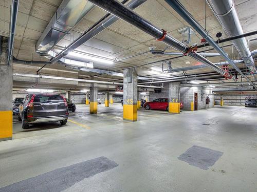 Garage - 409-3855 Boul. De Chenonceau, Laval (Chomedey), QC - Indoor Photo Showing Garage