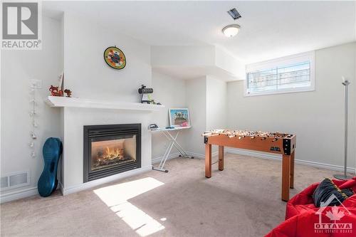 100 Marrissa Avenue, Ottawa, ON - Indoor Photo Showing Other Room With Fireplace