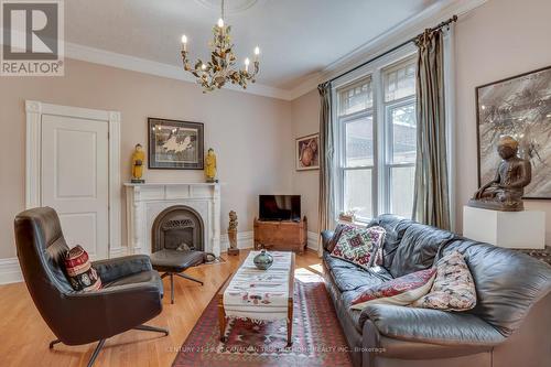 Family Room connected to kitchen - 504 Waterloo Street, London, ON - Indoor Photo Showing Living Room With Fireplace