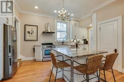 Kitchen island with sink and seating - 