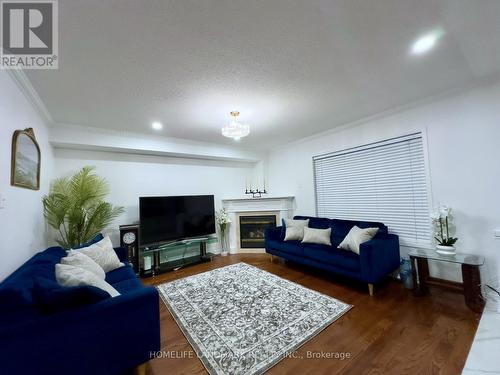 8 Stotts Crescent, Markham (Wismer), ON - Indoor Photo Showing Living Room With Fireplace