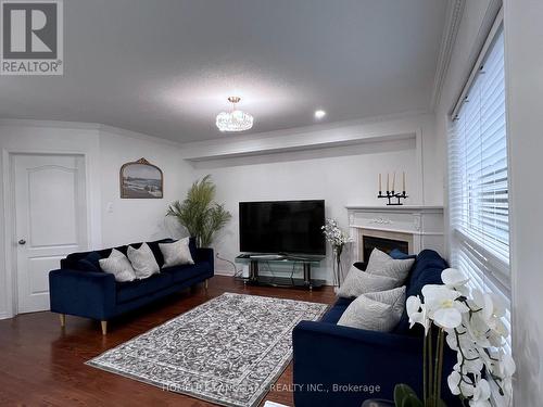 8 Stotts Crescent, Markham (Wismer), ON - Indoor Photo Showing Living Room With Fireplace