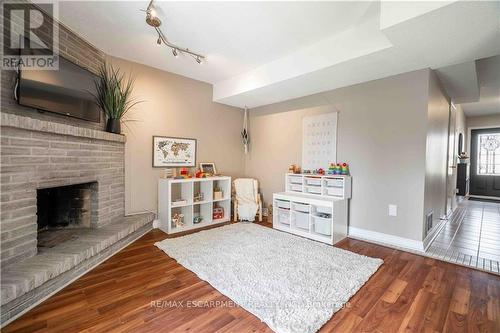 13 - 1155 Paramount Drive, Hamilton (Stoney Creek Mountain), ON - Indoor Photo Showing Living Room With Fireplace