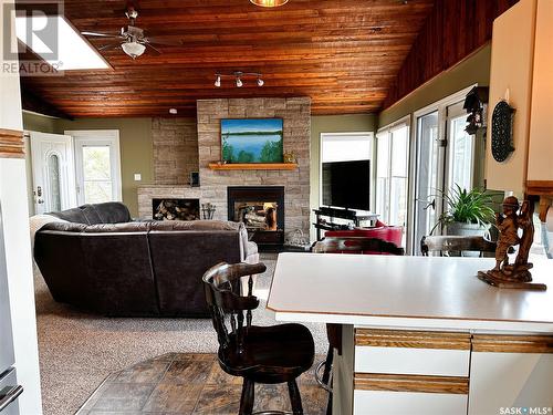 6 Sleepy Hollow Road, Jackfish Murray, SK - Indoor With Fireplace