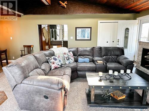 6 Sleepy Hollow Road, Jackfish Murray, SK - Indoor Photo Showing Living Room With Fireplace