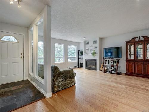 2436 Otter Point Rd, Sooke, BC - Indoor Photo Showing Living Room With Fireplace