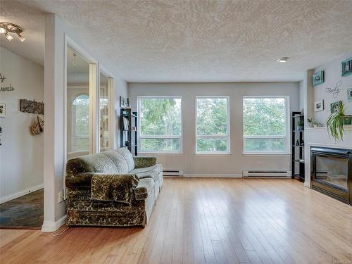 2436 Otter Point Rd, Sooke, BC - Indoor Photo Showing Living Room With Fireplace