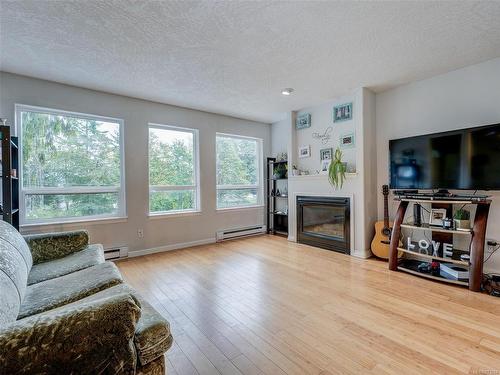 2436 Otter Point Rd, Sooke, BC - Indoor Photo Showing Living Room With Fireplace