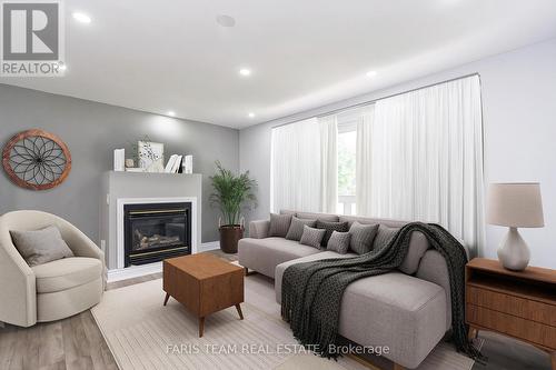 39 Brackenbury Street, Grey Highlands (Markdale), ON - Indoor Photo Showing Living Room With Fireplace