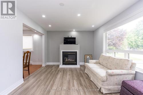 39 Brackenbury Street, Grey Highlands (Markdale), ON - Indoor Photo Showing Living Room With Fireplace