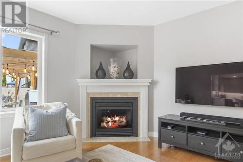 4 Pelee Street, Kanata, ON - Indoor Photo Showing Living Room With Fireplace