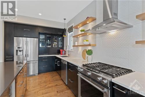 Gas Range, Coffee Nook with glass front cabinetry - 1870 Maple Grove Road, Ottawa, ON - Indoor Photo Showing Kitchen With Upgraded Kitchen