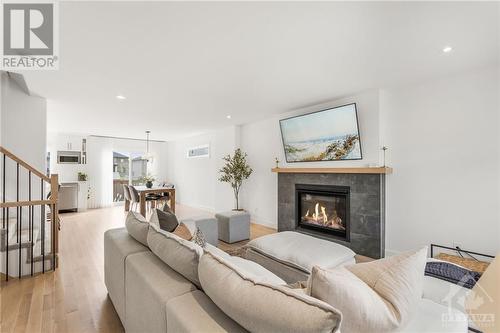 533 Marseille Street, Embrun, ON - Indoor Photo Showing Living Room With Fireplace