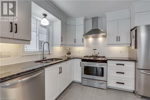 10 Fraser Drive, Stratford, ON - Indoor Photo Showing Kitchen With Stainless Steel Kitchen With Double Sink With Upgraded Kitchen