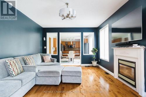 2021 Solar Place, Oshawa, ON - Indoor Photo Showing Living Room With Fireplace