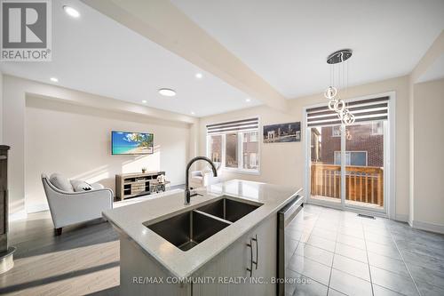 125 Jim Mortson Drive, East Gwillimbury, ON - Indoor Photo Showing Kitchen With Double Sink