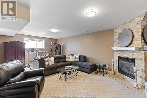 4817 Barcelona, Windsor, ON - Indoor Photo Showing Living Room With Fireplace