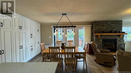 52 Levesque Street, Grand-Sault/Grand Falls, NB - Indoor Photo Showing Dining Room With Fireplace