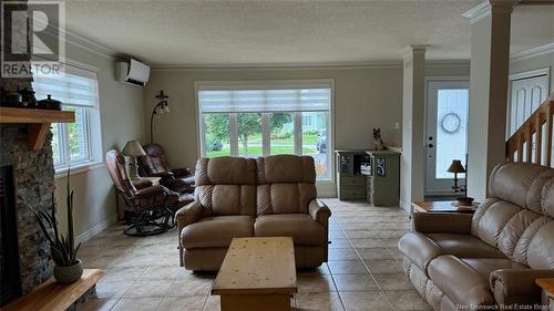 52 Levesque Street, Grand-Sault/Grand Falls, NB - Indoor Photo Showing Living Room With Fireplace