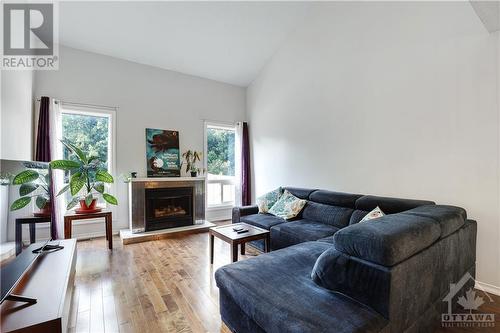 49 Springcreek Crescent, Ottawa, ON - Indoor Photo Showing Living Room With Fireplace