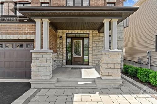 Fully Landscaped Front Walkway - 63 Boddington Street, Ottawa, ON - Outdoor With Deck Patio Veranda