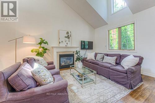 14 - 2141 Caroline Street, Burlington (Brant), ON - Indoor Photo Showing Living Room With Fireplace