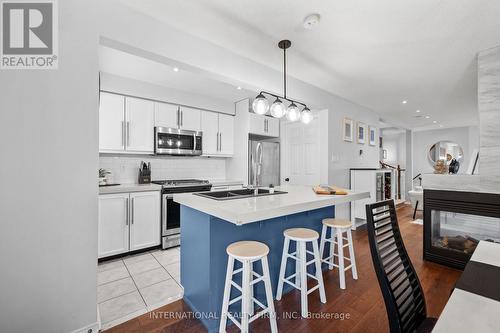 1794 Lampman Avenue, Burlington (Uptown), ON - Indoor Photo Showing Kitchen With Fireplace With Double Sink With Upgraded Kitchen