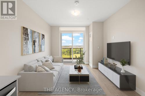 1207 - 3220 William Coltson Avenue, Oakville, ON - Indoor Photo Showing Living Room