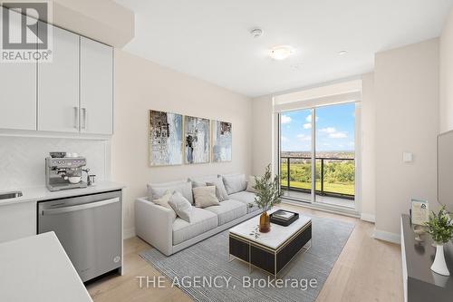 1207 - 3220 William Coltson Avenue, Oakville, ON - Indoor Photo Showing Living Room