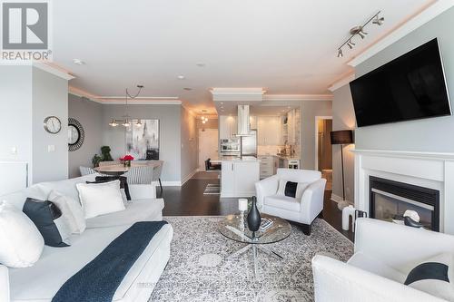 Ph404 - 88 Palace Pier Court, Toronto (Mimico), ON - Indoor Photo Showing Living Room With Fireplace