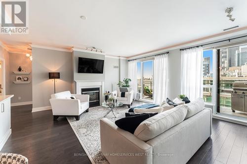 Ph404 - 88 Palace Pier Court, Toronto (Mimico), ON - Indoor Photo Showing Living Room With Fireplace